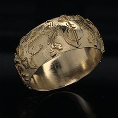 Coat of Arms jewelry was used by kings, knights and noblemen to display their family honor and to create wax seal for correspondence which authenticating the sender. You can have up to 2 initials engraved on the ring. This Ring can make a perfect gift for special Graduation, Birthday, Wedding, Christmas etc... Make this Handcrafted 14k Solid Gold Family Crest Ring style your own with inscription of your initials. If you like to have a specific symbol, logo or a family crest engraved on the ring, Arms Jewelry, Family Crest Ring, Family Crest Rings, Arm Ring, Antique Style Rings, Seal Gifts, Arm Jewelry, Custom Wedding Rings, Coat Of Arm