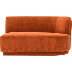 an orange couch sitting on top of a white floor