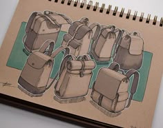 a notebook with drawings of backpacks on it