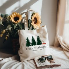 "Time to head to Forks, Washington.  Show your love for the Twilight Films with this cotton tote. This 100% cotton bag comes in one size - 15\" x 16\"- perfect for everyday wear. While the canvas material will show off your designs in great colors, it's durable and will last for years. The bag features 20\" handles (made from the same canvas), making it easy to carry even with a week's worth of shopping. .: 100% cotton canvas .: Heavy fabric (12 oz/yd² (406.9 g/m .: Sewn-in label" Twilight Film, Cotton Totes, Tote Bag Design, Cotton Bag, Canvas Material, Sew-in Labels, Canvas Tote, Washington, Cotton Canvas