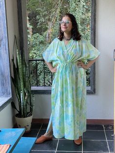 I made this caftan dress from a beautiful ombre watercolor pattern and is available in many colors. I used the softest mulmul cotton fabric to make this. It is extremely soft and it gets softer with every wash. It is so free flowing, that it will make you feel as if you aren't wearing anything at all ;) The beauty of the Kaftans is they will fit everyone so no need to worry about the size et all. All my Kaftans have deep necks(11-12 inches) so will fit all head sizes. However, the length of my k Green Bohemian Maxi Dress For Daywear, Green Maxi Dress With Kimono Sleeves For Vacation, Tie Dye Maxi Kaftan For Vacation, Tie Dye Flowy Maxi Kaftan, Flowy Tie Dye Maxi Kaftan, Green Kaftan For Daywear In Spring, Flowy Tie Dye Beach Dress For Vacation, Tie Dye Flowy Beach Dress For Vacation, Green Flowy Maxi Length Cover-up