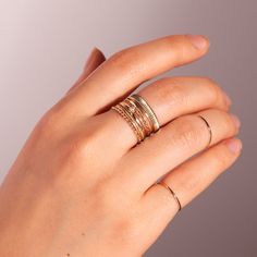 A shiny and shimmering coin-edged ring to wear on its own, or to add to a stack. Throw a coin in the metaphorical fountain! 14k Gold Stackable Midi Rings Fine Jewelry, Gold Stackable Midi Rings Fine Jewelry, Stackable 14k Gold Fine Jewelry Midi Rings, Stackable Yellow Gold Engraved Ring For Everyday Wear, Stackable Fine Jewelry Rings, Minimalist Gold Diamond Ring With Double Band, Gold 14k Stackable Rings, Fine Jewelry Stackable Gemstone Rings, Fine Jewelry Stackable Initial Open Ring