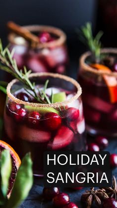 holiday sangria with cranberry and rosemary garnish