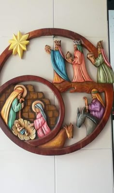 the nativity scene is displayed on the wall