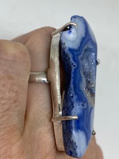 great color blue Lace agate stone The setting is handcrafted in low content silver About 2 inch long Size 6.5 Can be sized. My jeweler charges between $10-$15. All rings are shipped free in the US in a nice gift box. Check out our over a THOUSAND great reviews Engraving is $4 per letter and is not always perfect depending on the piece. It can take a few days if the jeweler is busy. This is payable to Paypal Judithsltd@gmail.com Blue Rings With Large Stone For Healing, Handmade Silver Geodes For Jewelry Making, Unique Blue Agate Jewelry, Blue Agate Geodes With Natural Stones, Blue Agate Geodes, Handmade Blue Geodes As Gifts, Handmade Blue Geodes For Gifts, Handmade Blue Geodes For Gift, Handmade Blue Geodes As A Gift