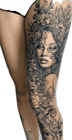 a woman's leg with tattoos and flowers on her body, in black and white