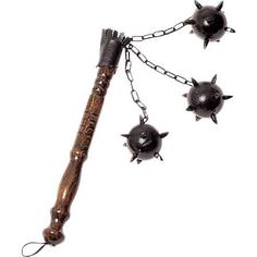 a wooden stick with spikes and chains attached to it