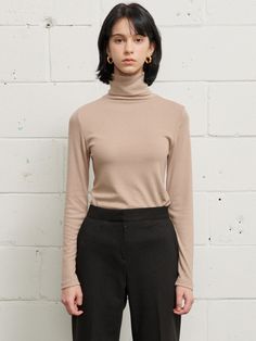 Editor's notesSoft and stretchy, this knit top has turtleneck silhouette and slim fit. Match yours with any items for an essential, cozy style. - Soft and stretchy- Slim fit- Turtleneck silhouette- Versatile stylingMeasurements(in.)Size One Size(XS-M)- Length: 24.80 in - Neck length: 6.69 in - Shoulder: 13.39 in - Bust: 13.78 in - Sleeve: 23.62 in * Model info: Height 5' 8 Bust 29 Waist 22 Hip 33Composition & Care- 67% Rayon, 28% Wool, 5% Spandex - Dry Cleaning Designer- by Jude McCall Fitted Turtleneck, Cozy Style, Wool Knit, Inspiration Art, Cozy Fashion, Knit Top, Layering, High Neck, Knitwear