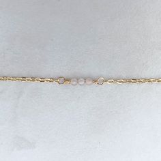 The daintiest adornment for your wrist (or anklet!). Details: - 14k gold-filled cable chain - your choice of round micro-faceted gemstones - round spring clasp Please note: If you do not see your bracelet/anklet size, please reach out to us at info@hellorising.com. We believe everyone deserves to wear pretty jewelry. Gemstones: Clear quartz, known as the stone of power, is believed to be able to amplify energies and protect against negativity. Labradorite, a stone of transformation that can prot Delicate Adjustable Jewelry For Meditation, Holistic Friendship Bracelet Jewelry, Minimalist Gemstone Bracelets For Meditation, Minimalist Crystal Bracelet With Natural Stones For Everyday, Minimalist Everyday Crystal Bracelet With Natural Stones, Dainty Rose Quartz Bracelets With Natural Stones, Minimalist Natural Stones Crystal Bracelet As Gift, Dainty Hypoallergenic Beaded Bracelets For Healing, Dainty Rose Quartz Bracelet With Natural Stones