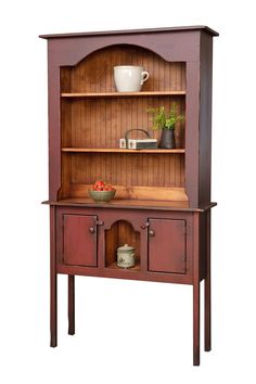 an old fashioned wooden hutch with drawers