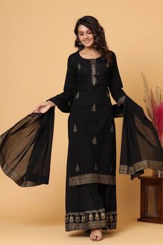 This is a 3-piece set. The set consists of embellished & embroidered kurta has round neck, 3/4th sleeves, calf length teamed with flared sharara pants and dupatta. 3-piece set Color-Black Fabric-Silk Kurta Length-Calf Length Sleeves-3/4th Sleeves Neck-Round Neck Work - Embellished & Embroidery Detailing Washing Care-Regular Wash or Machine Wash Flared Sharara, Embellished Embroidery, Embroidered Sharara, Sharara Pants, Embroidery Detailing, Silk Kurta, Sharara Set, Fabric Silk, Embroidery Details