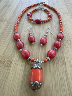 carnelian stone pendant, orange and red howlite beads, silver beads orange, red and silver necklace 18 inch, bracelet 7 inch, toggle clasp Orange Carnelian Beaded Necklace With Large Beads, Carnelian Round Beads Crystal Necklace, Orange Carnelian Round Bead Jewelry, Orange Carnelian Large Beads Necklace, Hand-strung Red Carnelian Beaded Necklaces, Red And Silver, Carnelian Stone, Creating Jewelry, Stone Pendant