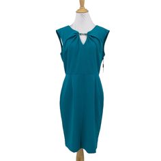 Calvin Klein Sheath Dress Womens 8 Sleeveless Back Zip Keyhole Turquoise Clasp Item Description Brand Name: Calvin Klein Condition: New With Tag Size: 8 Location (Custom Label) = Hh 109 Material + Measurements (Please See Pictures) Repaired Hole Left Side Please Note That Clothing Items May Fit Differently Due To Brand, Fit, Use Or Prior Customization. We Strongly Urge You To Check The Measurements Above To Guarantee Proper Fitting. This Is From A Smoke Free Home. Elegant Sleeveless Turquoise Dress, Casual Knee-length Sleeveless Dress By Calvin Klein, Calvin Klein Green Knee-length Dress, Calvin Klein Knee-length Bodycon Evening Dress, Casual V-neck Calvin Klein Dress, Elegant Calvin Klein Sleeveless V-neck Dress, Calvin Klein Fitted V-neck Sleeveless Dress, Calvin Klein Fitted Sleeveless V-neck Dress, Size 8 Dress