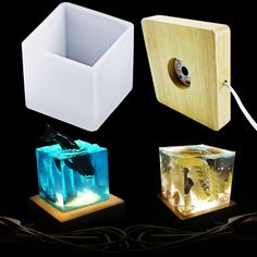 four different types of light up cubes with wires attached to the sides and an electric plug in between them