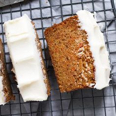 three slices of carrot cake on a cooling rack