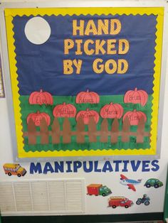 a bulletin board that says hand picked by god with pictures of pumpkins on it