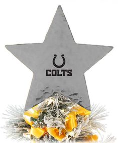 the indianapolis colts star ornament has been placed on top of some tinsel