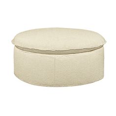 a round ottoman with a white cover on it's sides and a beige cushion