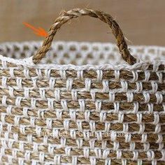 a close up of a basket with an orange arrow pointing to the bottom of it