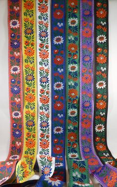 You can use this ribbon to decorate your Czech or Slovak national costume - Kroje.   Don't have a Kroje?  No problem!   It has many other creative uses!    I've used it on the sleeves of my peasant blouses, as a trim down the front of a bathrobe and to decorate my kitchen aprons. 100% polyester.  It is available in white, yellow, green, blue, red, black and purple. I import this ribbon directly from the manufacturer in the Czech Republic. The price is per meter.  I will cut a continuous length o Folk Band, Polish Traditions, Slavic Folklore, National Costume, Folk Dresses, Folk Dance, Black And Purple, Kitchen Aprons, Peasant Blouse