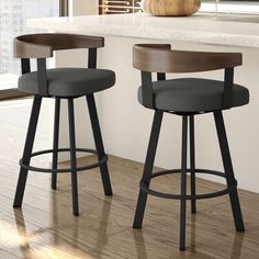 two black and brown stools in front of a counter