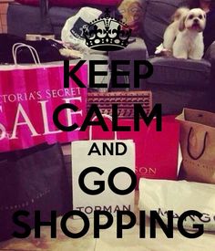 there is a dog sitting on the couch with shopping bags in front of it and a sign that says keep calm and go shopping