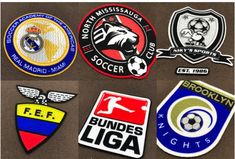 several different patches on the back of a jacket with words that read north mississippi soccer club