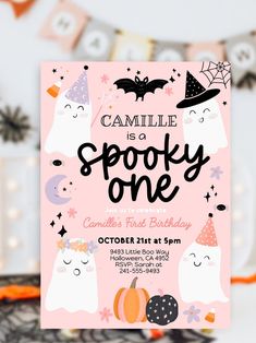 a pink halloween birthday party card with cats and bats