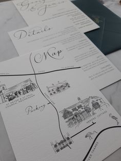 the wedding stationery is laid out on top of each other