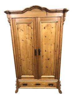 a wooden armoire with two doors and drawers on the front, against a white background