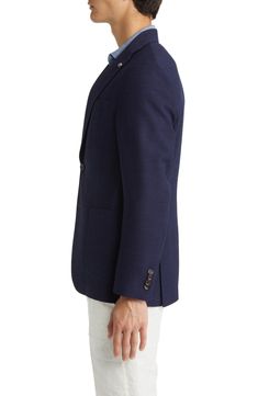 Cut from stretch-enhnaced wool, this sport coat is a dapper way to take on the day. 29 1/2" length (size 40R) Notched lapels Front patch pockets Partially lined 98% wool, 2% Lycra® spandex Dry clean Made in Canada Navy Sport Coat With Lapel Collar, Blue Sport Coat With Notch Lapel And Welt Pockets, Tailored Blue Sport Coat With Double Button, Tailored Blue Sport Coat With Double Button Closure, Navy Business Sport Coat With Double Button Closure, Blue Notch Lapel Sport Coat With Hidden Button Closure, Navy Tailored Peacoat For Business, Navy Formal Sport Coat With Lapel Collar, Navy Elegant Sport Coat With Lapel Collar