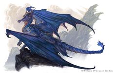 a blue dragon sitting on top of a rock