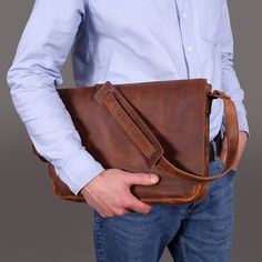 Custom Leather Messenger for Men - Leather Office Bag 👜✨ Elevate your office style with our Custom Leather Briefcase! Handcrafted from premium leather, this bag is the perfect blend of sophistication and practicality. Whether you're heading to a meeting or working remotely, this versatile bag will keep you organized and stylish. Key Features: ✅ Personalized Monogramming: Make it uniquely yours by adding your initials or name. ✒️ ✅ Spacious Interior: Fits a laptop and all your essential document Classic Laptop Bag With Leather Backing, Classic Office Shoulder Bag With Waxed Finish, Classic Waxed Finish Shoulder Bag For Office, Modern Business Satchel With Leather Backing, Rectangular Waxed Finish Business Briefcase, Leather Briefcase Perfect For A Gift, Leather Briefcase With Soft Leather As Gift, Business Leather Bag With Waxed Finish, Modern Leather Shoulder Bag For Gift