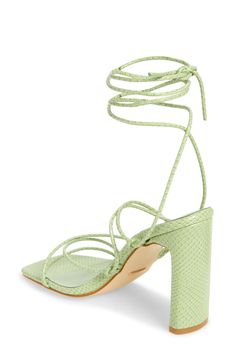 A slender block heel adds a sophisticated flourish to a strappy sandal designed with a squared-open toe. Wraparound ankle strap with tie closure Synthetic upper, lining and sole Imported Fitted Strappy Lace-up Sandals With 4-inch Heel, Summer Strappy T-strap Sandals With Heel Loop, Summer T-strap Strappy Sandals With Heel Loop, Chic Green High Heel Lace-up Sandals, Green Synthetic Sandals With 4-inch Heel, Designer Sandals, Strappy Sandals, Open Toe, Ankle Strap