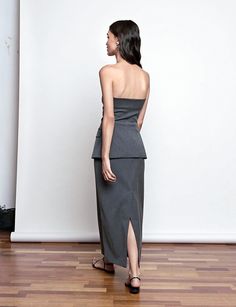 FINAL SALE Grey button strapless top. Styles with matching grey Nia maxi skirt .Brand Pixie Market63% polyester/20% rayon/15% wool/2% spandexFully lined, Multi button front openingSize XS bust 32" waist 24"Size S bust 34" waist 26"Size M bust 36",waist 28"Size L bust 38", waist 30"Length 18"Model is wearing a size small Dry Clean onlyImported Grey Maxi Skirts, Grey Maxi, Fitted Skirt, Small Waist, Best Sellers, Strapless Top, Final Sale, Maxi Skirt, Top Styles