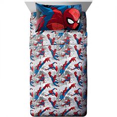 spiderman bedding set with blue and red sheets on top of the sheet cover