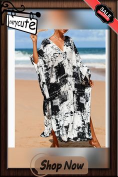 Black Print Long Kinimo Beachwear Flowy Casual Cover-up For Vacation, Casual Flowy Vacation Cover-up, Casual Black Cover-up For Vacation, Black Tropical Style Cover-up For Summer, Oversized Black Beach Cover-up, Black Flowy Cover-up For Vacation, Black Tropical Style Beach Cover-up, Oversized Black Cover-up For Beach, Black Tropical Style Summer Cover-up