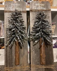 two wooden christmas trees on top of each other