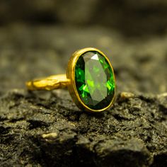 Greek Gold Emerald Ring | Tiny Green Ring | 925 Sterling Silver Ring 24K Gold Plated | Ancient Stacking | Dainty Gemstone Gift Handcrafted hammered Silver Ring Our shop offer free ring sizing and color options.(Oxidized(Black),Gold Plated) Metal : 925 Sterling Silver Plated : 24K Gold Gemstone :Lab Emerald Gem Size : 12 X 9 mm Band Size : 2 mm Ring Weight : 4 grams Ring Size : US 6 (The size you want is made for free). (We used the US standard sizing) **Custom Orders is Made** As pellada family, 22k Gold Emerald Gemstone Ring As Gift, 22k Gold Bezel Setting Jewelry Gift, 22k Gold Jewelry With Bezel Setting Gift, Gold Emerald Ring With Stone Setting As Gift, 22k Gold Gemstone Rings For Gift, Gold Emerald Ring, Greek Ring, Smaragd Ring, Hammered Silver Ring