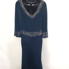 Jk Ara Dress Navy Blue Beaded Trim Cape Stunning Dress Perfect For Any Special Occasion! Chiffon Style Cape Style/Beaded Trim Front And Back V-Neck Length 59" Armpit To Armpit 18" Color Navy Blue Size 8 Brand New With Tags Formal Beaded V-neck Evening Dress, Long Sleeve Beaded Formal Dress, Elegant Blue Embellished Mother Of The Bride Dress, Formal Blue Beaded Dress, Blue Embellished Long Sleeve Mother Of The Bride Dress, Blue Beaded Formal Dress, Formal Blue Embellished Dress, Blue Beaded Cocktail Dress, Chiffon Style