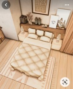 a bed room with a neatly made bed next to a dresser and mirror on the wall