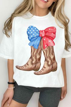 A Coquette 4th of July Shirt, Cowgirl Vintage 4th of july Tee Soft and perfect for summer. A retro 4th of July Shirt, perfect as an outfit for our independence day. Merica fourth of July Tshirt Q U I C K * F A C T S * ♥️ 100% Soft cotton ♥️Design is high quality digital print ♥️ Wash and dry normally. Do not iron directly on the print. * S I Z I N G * ♥️ Sizing is unisex so runs like men's ♥️Most women find their typical size works best. ♥️ Please see size guide in last listing photo for all mea Cute American Flag Print T-shirt For Summer, Spring Americana Short Sleeve T-shirt, White Americana T-shirt For Summer, White Americana Style Summer T-shirt, Americana Short Sleeve T-shirt For Summer, Summer Americana Short Sleeve T-shirt, Americana Style Short Sleeve T-shirt For Summer, White Americana Tops For Summer, White Americana Style Tops For Summer