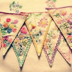 the bunting is decorated with colorful flowers