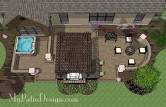 an aerial view of a house with a pool in the middle and patio furniture on the other side