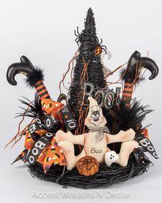 a basket filled with lots of halloween decorations