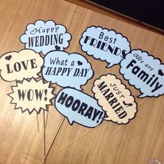 some stickers that say best friends and have speech bubbles with words above them on a wooden table