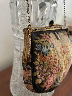 "Antique Vintage 1920s - 30s French Petit Point Evening Bag Purse Jeweled Frame Beautiful floral French petit point purse with jeweled frame of rhinestones and onyx. Excellent condition inside and out. The interior has two pockets on either side. The purse measures, 6\" across the bottom, 5.50\" across the top, x 4.50\" (not including clasp) and the chain hangs  6\" long. It is in excellent Antique condition, inside and out. Thanks for stopping by! Please let me know if you need additional infor Vintage Rectangular Evening Bag, Vintage Rectangular Evening Bag For Luncheon, Antique Style Clutch For Vintage Events, Antique Clutch Evening Bag For Vintage Events, Vintage Evening Bag For Vintage Events, Victorian Style Rectangular Evening Bag, Victorian Rectangular Evening Bag, Antique Rectangular Bags For Vintage Fashion, Antique Rectangular Wedding Bags