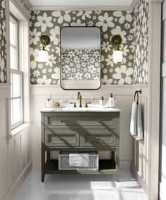 a bathroom with two sinks and a large mirror over it's counter top,