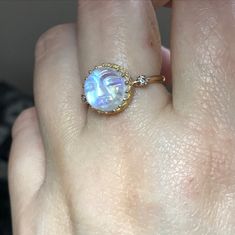 Please go to my Instagram to watch the video about this ring~ PRODUCT VIDEO ⇒ https://goo.gl/tkrFcq Like a little moon glowing In the sky. This stunning Man face rainbow moonstone dances with iridescence like you wouldn't believe. Such an elegant piece and with so much character. Perfect from day to night. Each piece of rainbow moonstone was hand carved, it's unique and charm. This listing is for one piece of rainbow moonstone ring only. Also available other stones, please see last photo. Gem: 1 Yellow Gold Moonstone Jewelry, Unique Yellow Gold Moonstone Jewelry, Unique Yellow Gold Moonstone Ring, Handmade Fine Jewelry Yellow Gold Moonstone Ring, Handmade Yellow Gold Moonstone Ring Fine Jewelry, Handmade Yellow Gold Moonstone Ring, Unique 14k Gold Moonstone Ring Gift, Celestial Moonstone Jewelry In Yellow Gold, Celestial Moonstone Yellow Gold Jewelry