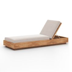 a bed that is made out of wood and has a mattress on top of it